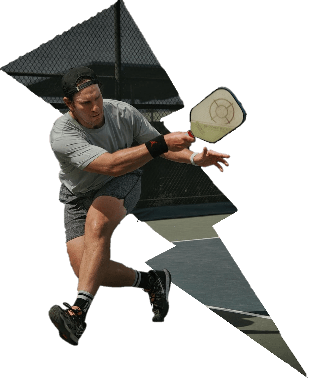 Pickleball player lunging for a shot